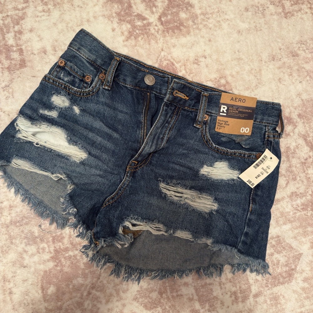 High-Waisted Blue Jean Shorts with Distressed Raw Hem